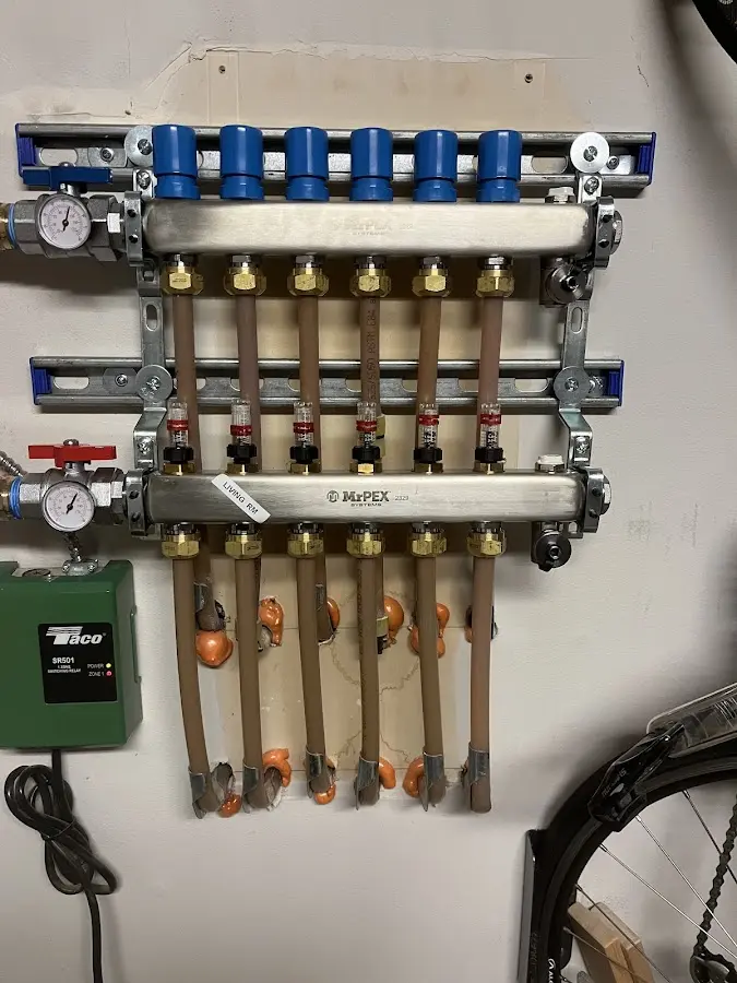 Plumber performing Gas Line Installation at a residential property in Stanford